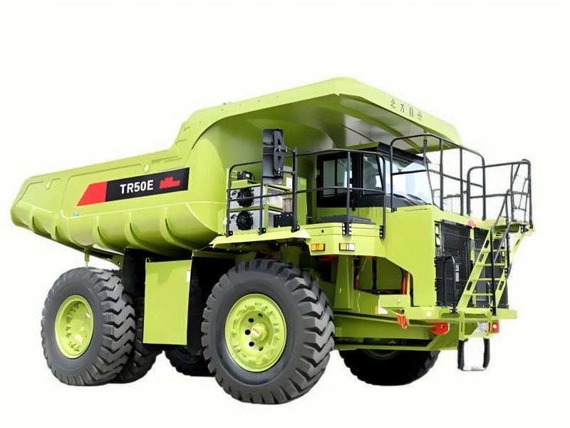Large electric mining trucks operating in a mining site